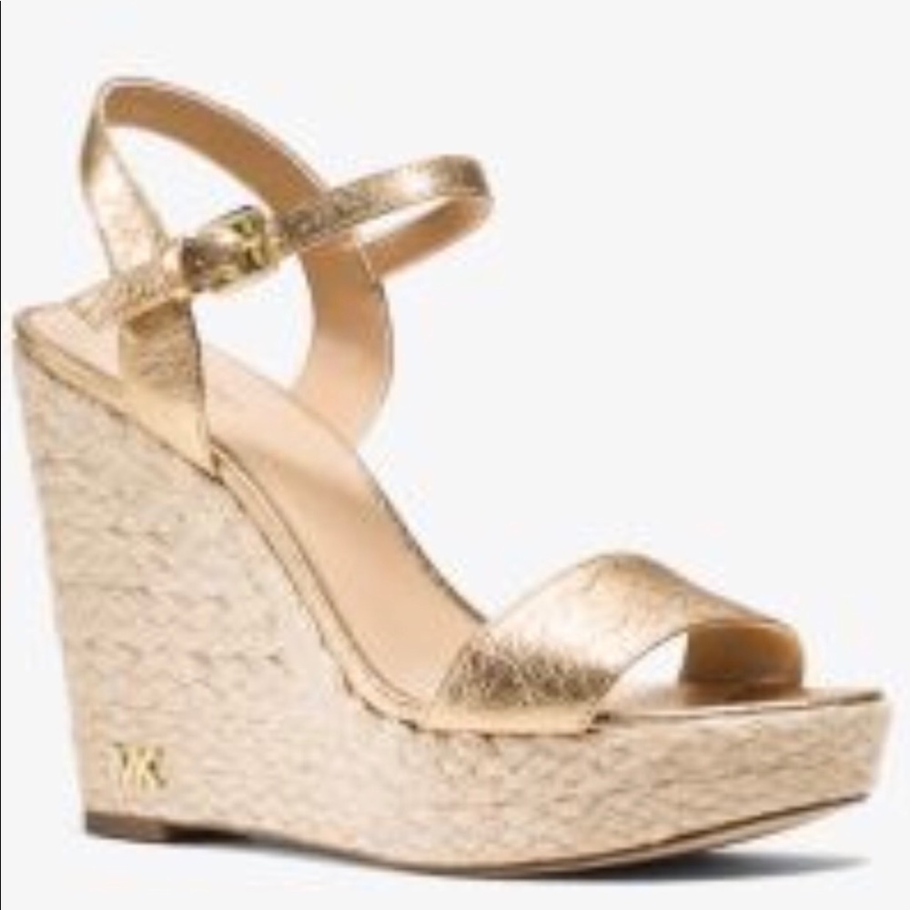Mk wedge. Brand new. Never worn. Gold wedge